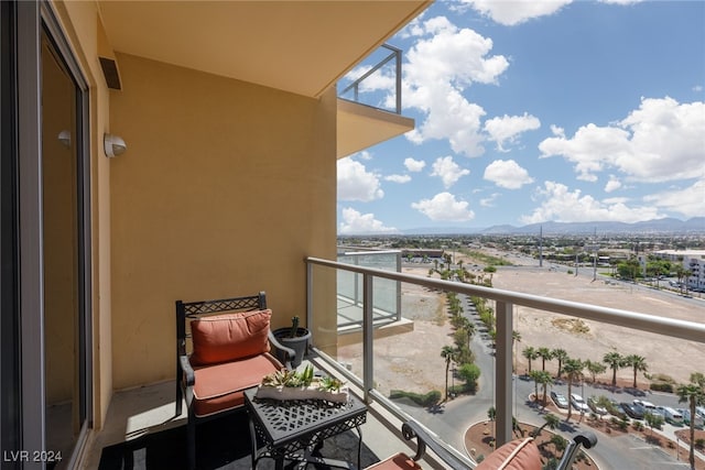 balcony featuring a mountain view