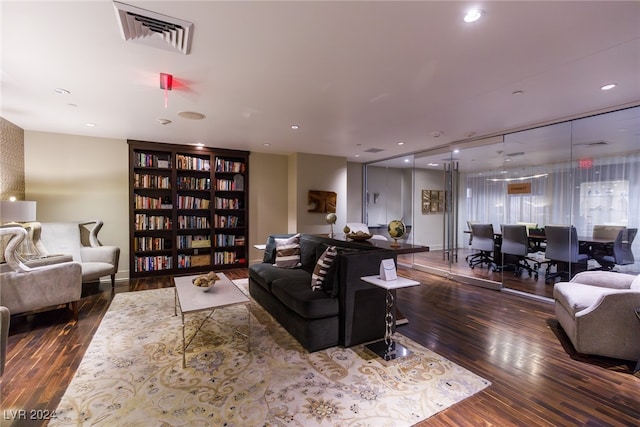 living room with dark wood-type flooring