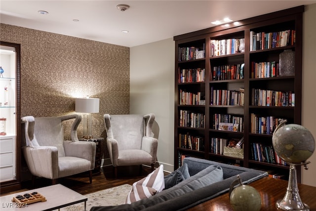 living area with wood-type flooring