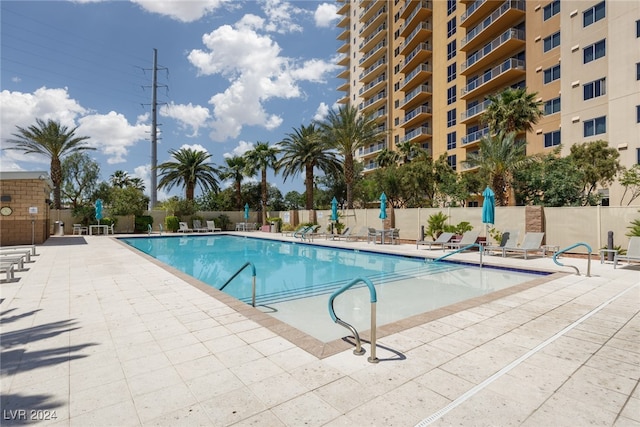 view of pool featuring a patio area