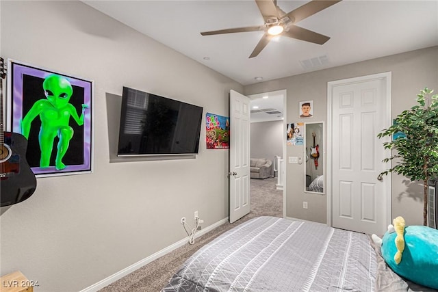 carpeted bedroom featuring ceiling fan