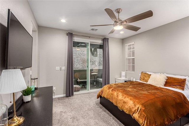 bedroom with access to outside, ceiling fan, and carpet