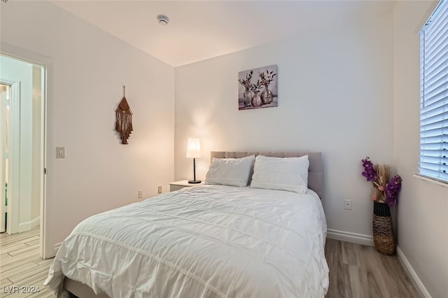 bedroom featuring light wood-type flooring