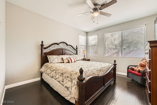 bedroom featuring ceiling fan and dark wood-type flooring