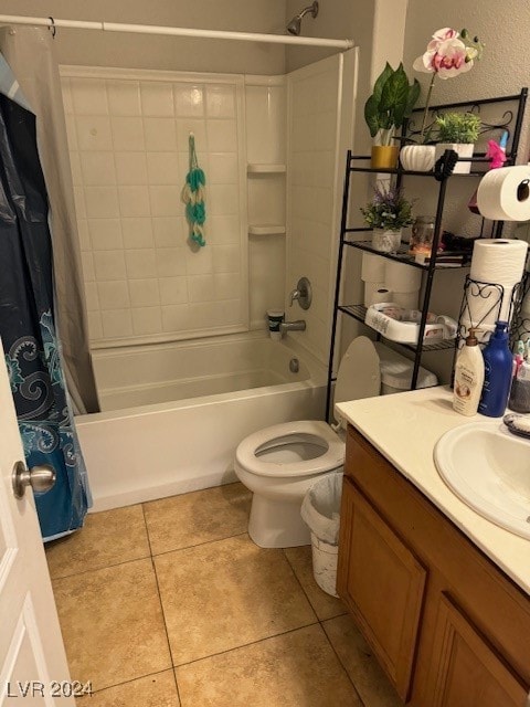 full bathroom with tile patterned flooring, vanity, shower / bath combo, and toilet