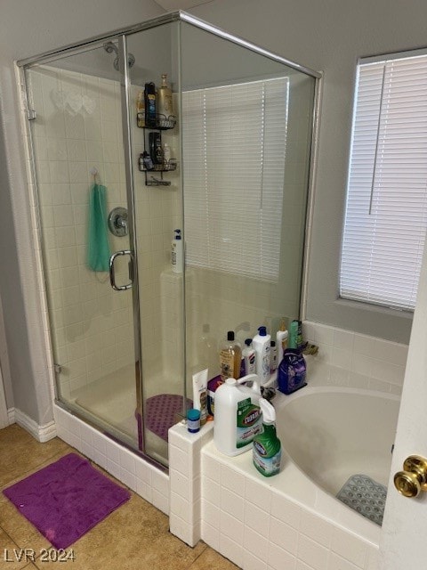 bathroom featuring separate shower and tub and tile patterned floors