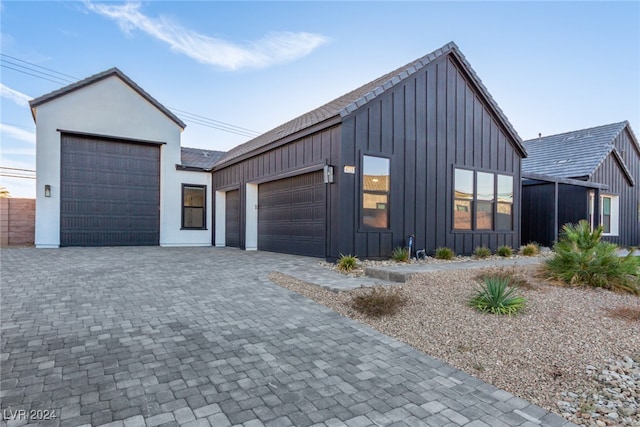 view of front of property with a garage