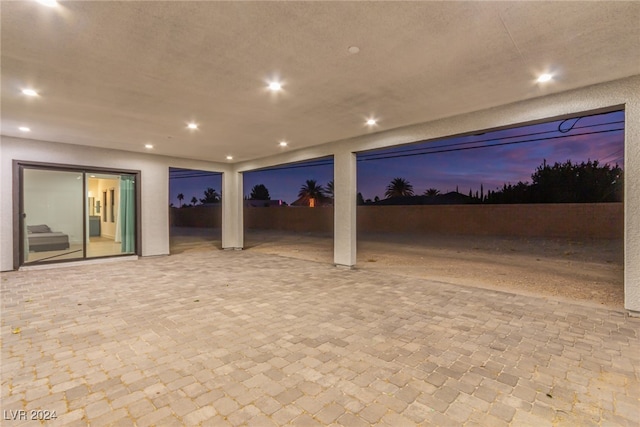 basement featuring a textured ceiling