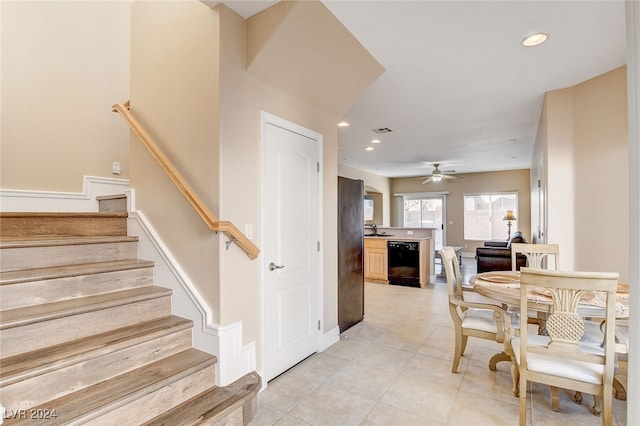 staircase with recessed lighting, visible vents, ceiling fan, and tile patterned flooring