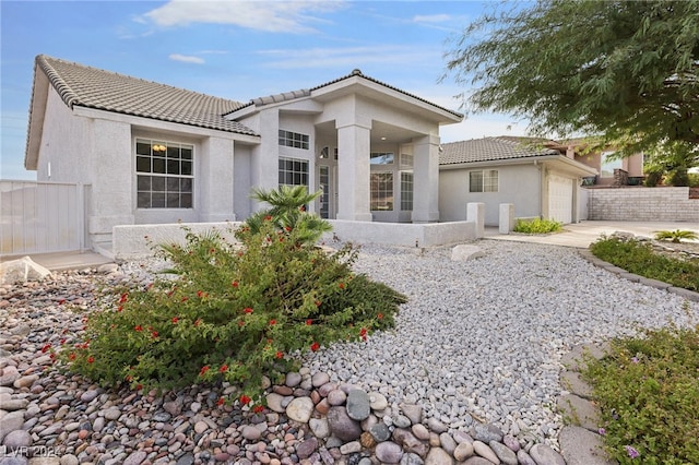 view of front of home featuring a garage