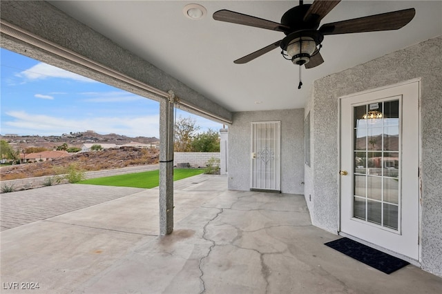 view of patio with ceiling fan