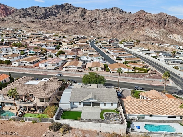 drone / aerial view featuring a mountain view