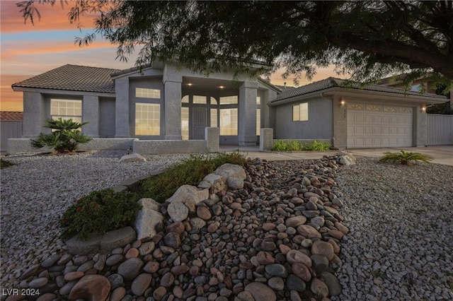 view of front of house with a garage