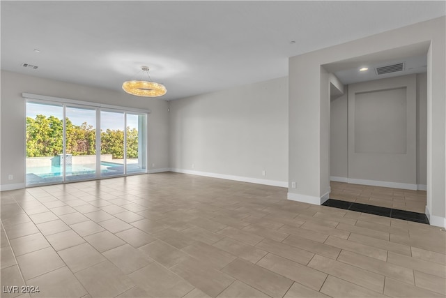 view of tiled spare room