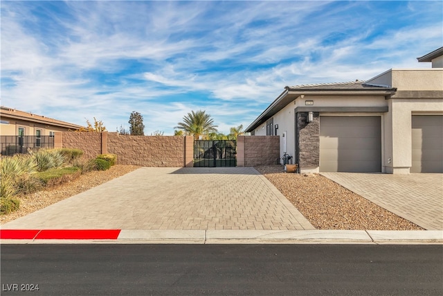 view of side of home with a garage