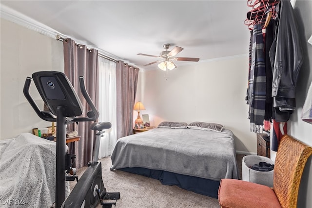 bedroom featuring carpet, ceiling fan, and ornamental molding