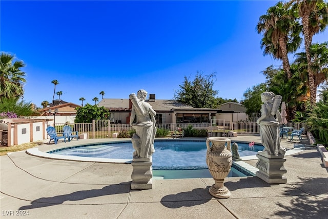 view of pool featuring a patio area