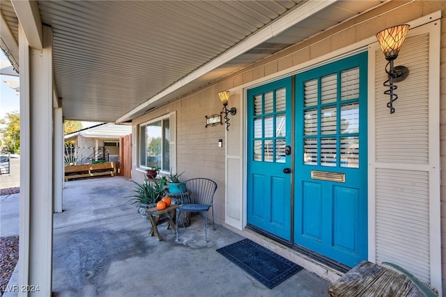 entrance to property with a porch