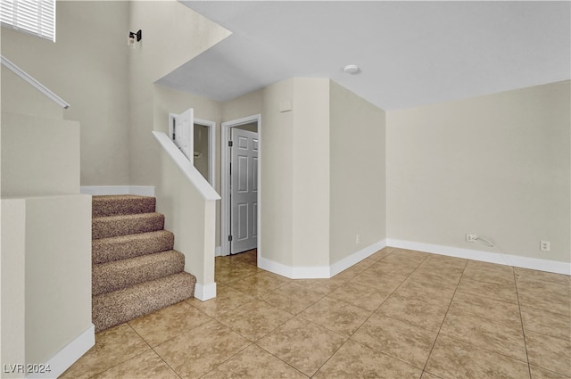 interior space with tile patterned floors