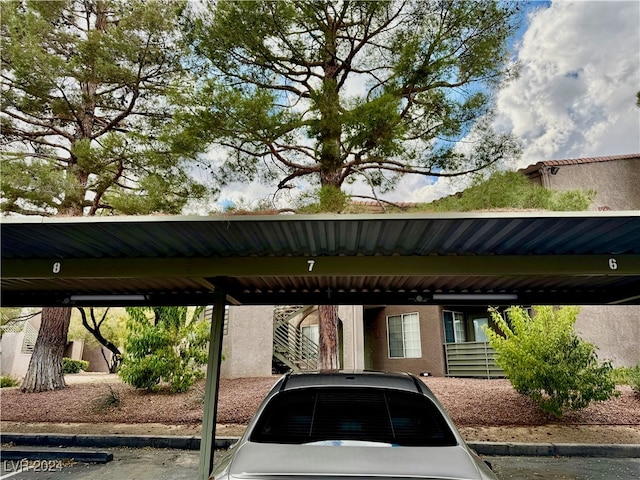 view of car parking featuring a carport