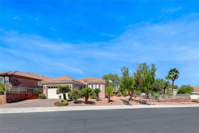 view of front of property featuring a garage