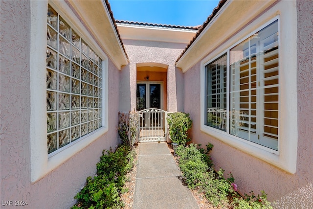 doorway to property with french doors