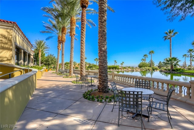 view of patio featuring a water view