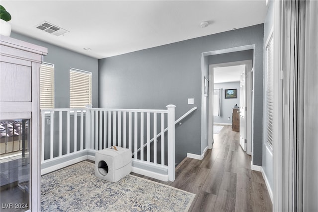 hallway featuring dark hardwood / wood-style flooring