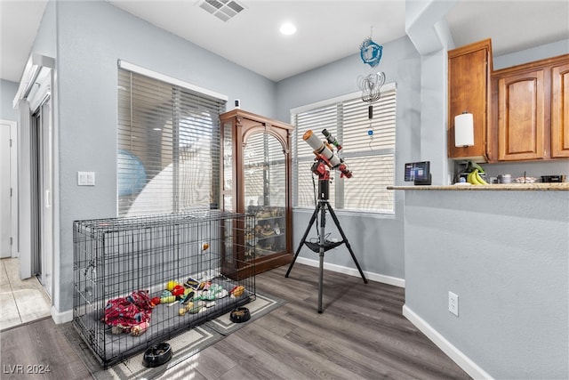 recreation room featuring hardwood / wood-style flooring