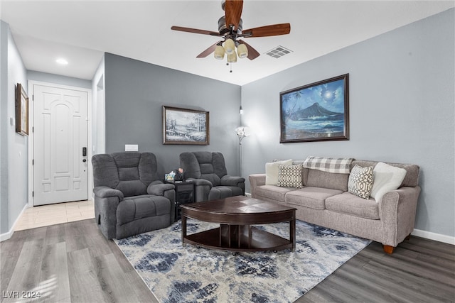 living room with ceiling fan and wood-type flooring