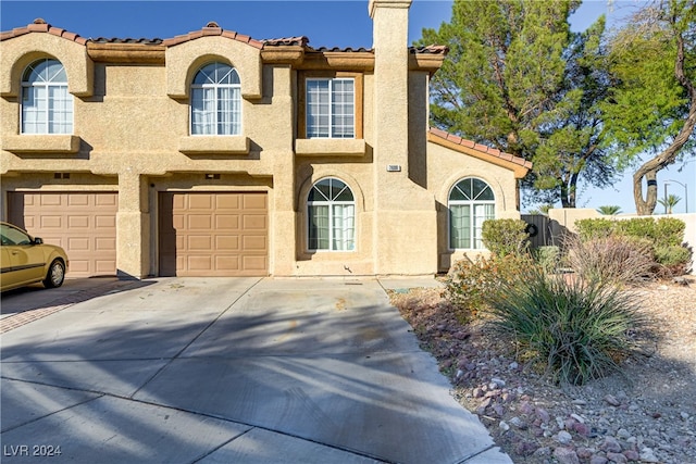 view of front of property featuring a garage