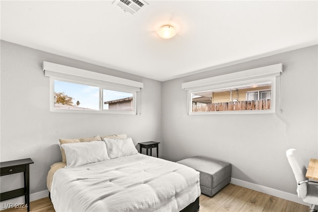 bedroom featuring light wood-type flooring