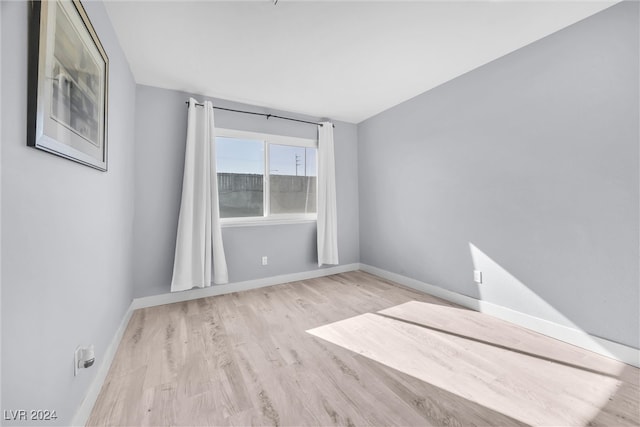 empty room with light wood-type flooring