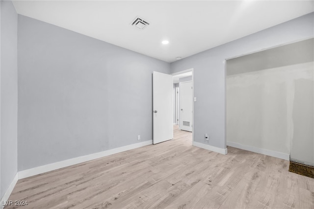 unfurnished bedroom with light hardwood / wood-style floors