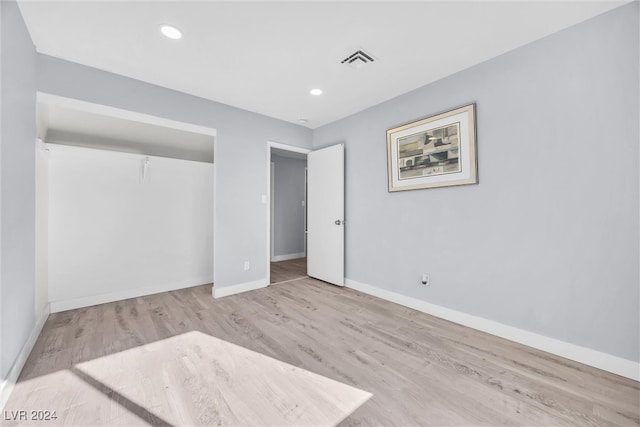 unfurnished bedroom with light hardwood / wood-style flooring