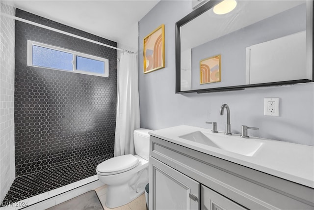 bathroom with tile patterned floors, vanity, toilet, and a shower with curtain