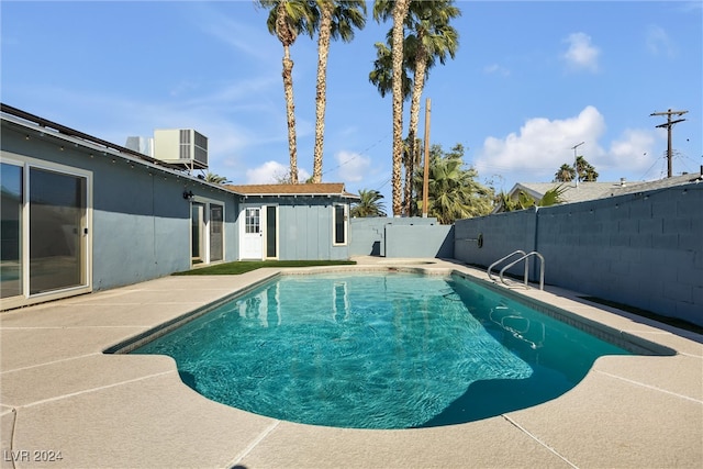 view of pool featuring a patio area