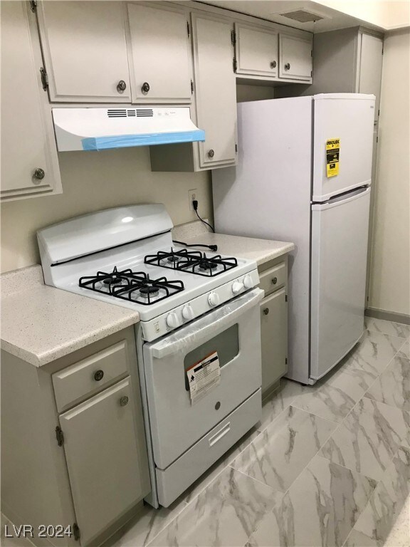 kitchen with white appliances