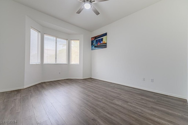 empty room featuring hardwood / wood-style flooring and ceiling fan