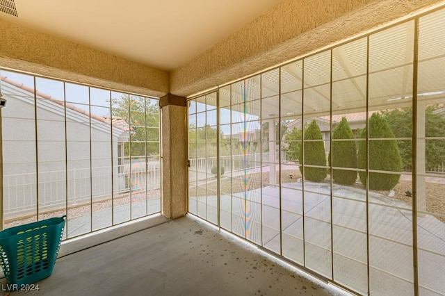 view of unfurnished sunroom