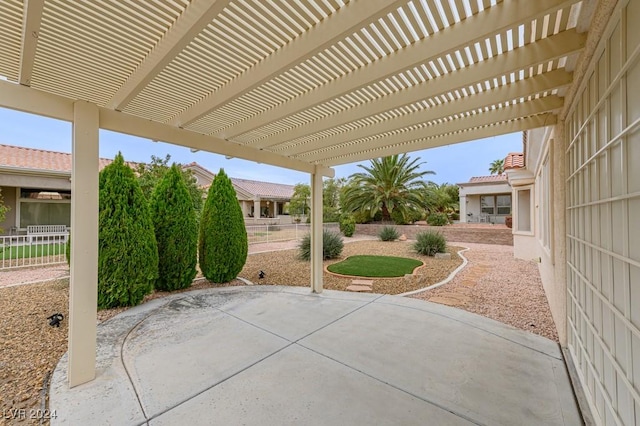 view of patio featuring a pergola