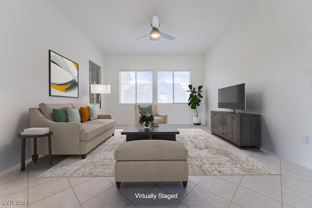 living room featuring ceiling fan and light tile patterned floors