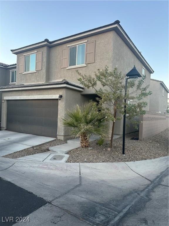 view of front of property featuring a garage