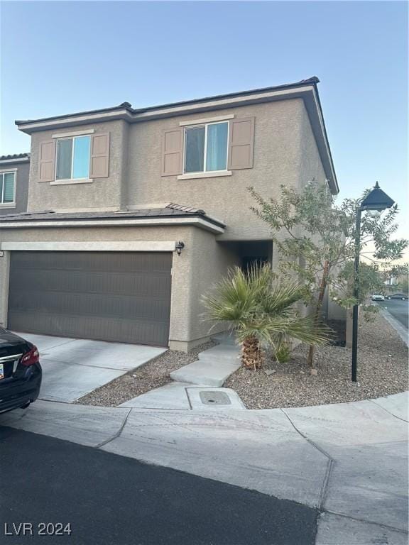 view of property featuring a garage