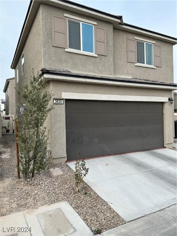 view of property with a garage