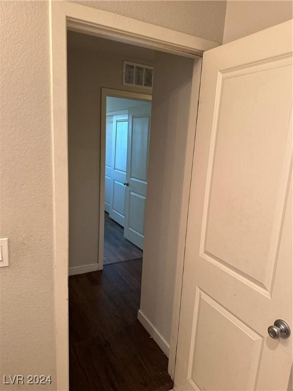 hall featuring dark hardwood / wood-style flooring