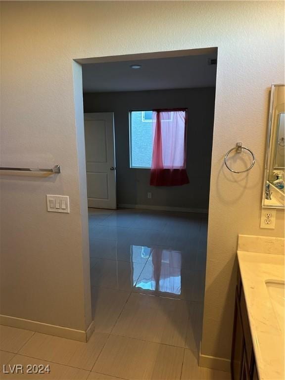 bathroom featuring vanity and tile patterned floors