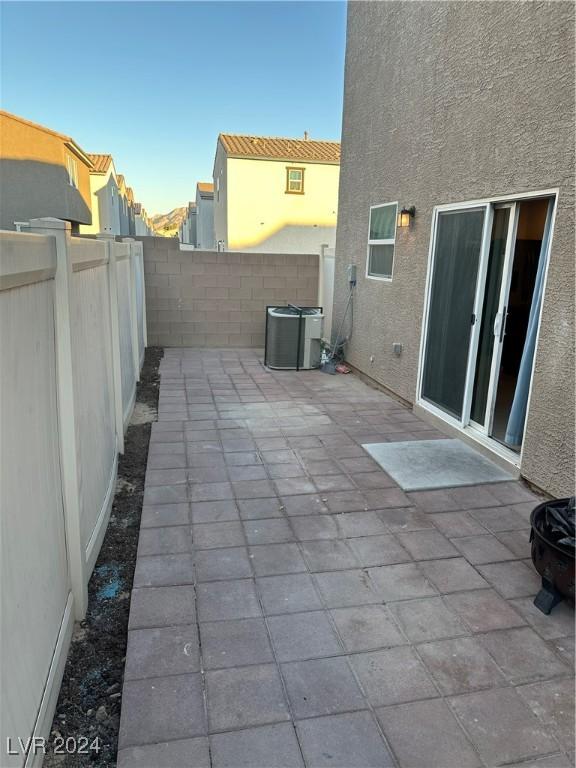 view of patio / terrace with central AC unit