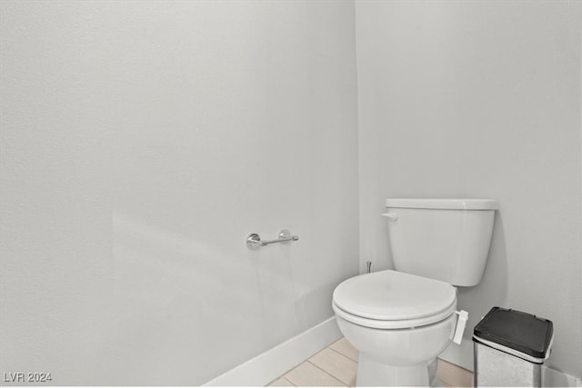 bathroom featuring tile patterned floors and toilet