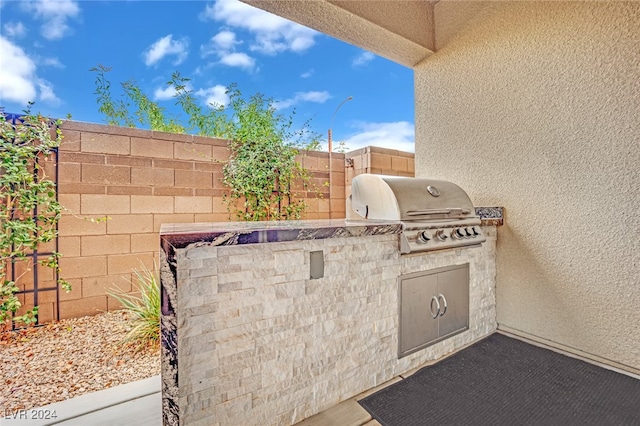 view of patio / terrace with area for grilling and exterior kitchen